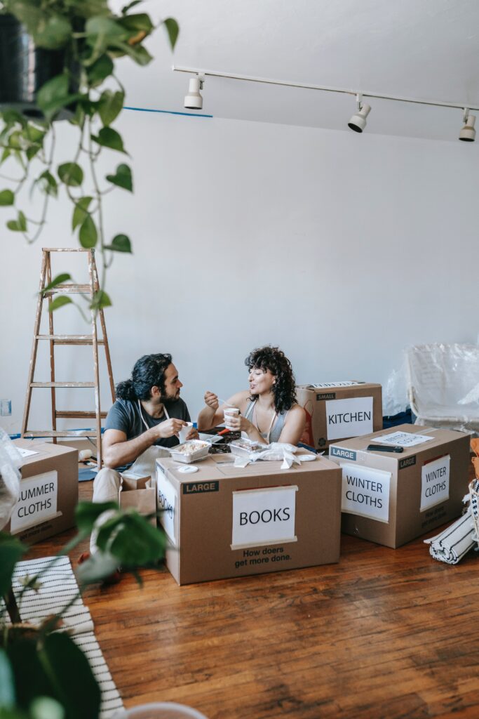 A happy and smart family preparing to move to their new home