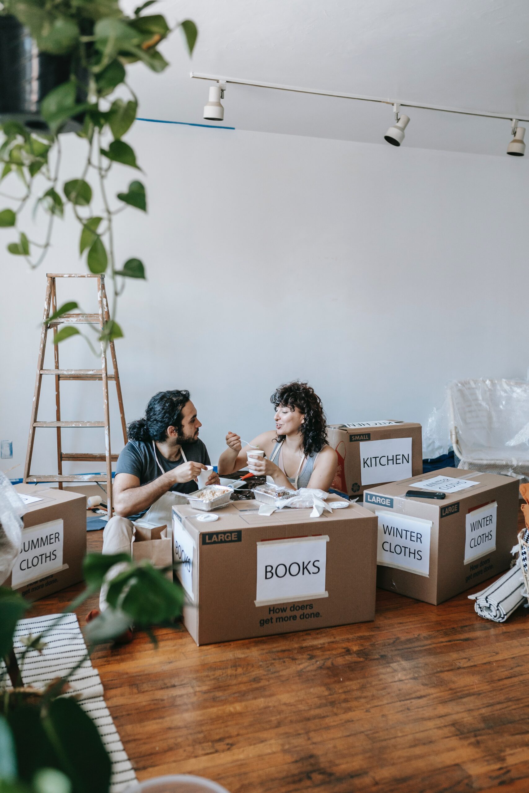 A happy and smart family preparing to move to their new home